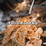 man starting fire with ferro rod