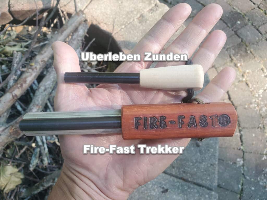 size comparison Uberleben Zunden vs fire-fast trekker ferro rods (held in man's hand)